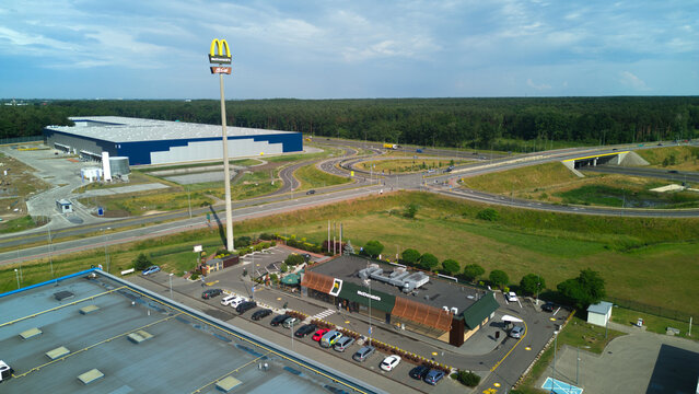 Aerial view, Mc Donalds sign close to highway, near Warsaw, Poland, May 23, 2023
