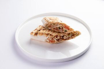 Shawarma. A traditional dish of meat and foschi wrapped in flatbread.