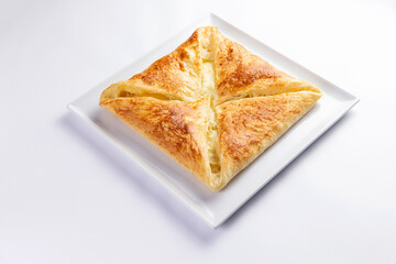 Traditional cheese pie. Khachapuri. On a white background.