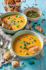 Yellow pumpkin soup as meal for autumn.