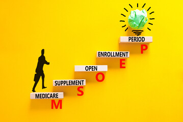 MSOEP symbol. Concept words MSOEP medicare supplement open enrollment period on wooden block....