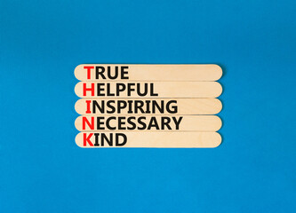 Think symbol. Concept words Think before you speak true helpful inspiring necessary kind on wooden stick. Beautiful blue background. Business Think true helpful inspiring necessary kind concept.