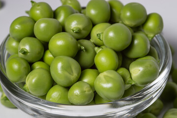close up green peas in a bowl