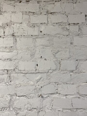 Brick wall, painted white.