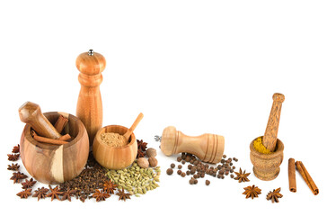 Mortar with pestle, hand mill and spices set isolated on white . Collage.