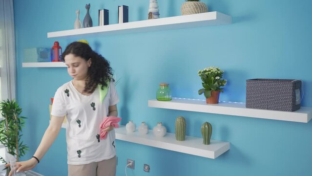 Clumsy and clumsy young woman who can't clean.