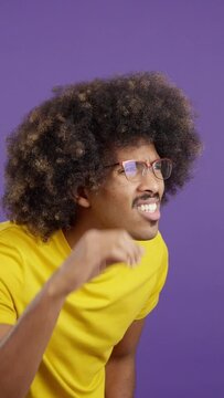 Man taking off her glasses to see far away