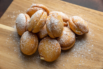 Delicious cookies on a wooden board. Close up