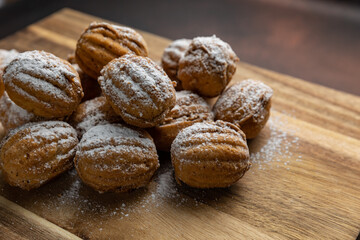 Delicious cookies on a wooden board. Close up