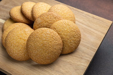 Delicious cookies on a wooden board. Close up