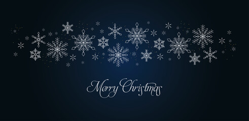 Navy christmas background with snowflakes and gold sequins
