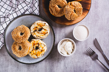 Creme brulee bagels with cream cheese and caramelized sugar on a plate top view