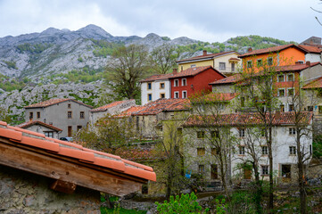 Fototapeta na wymiar Old houses in remote mountain village Sotres, Picos de Europa mountains, Asturias, North of Spain