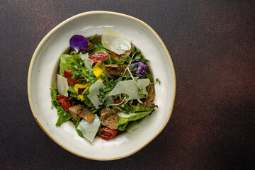 A delicious salad from a restaurant. Close-up