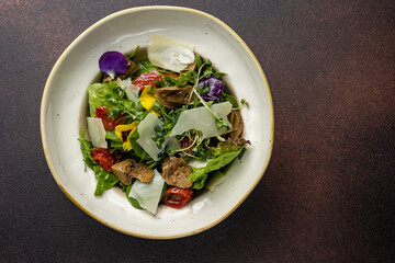 A delicious salad from a restaurant. Close-up