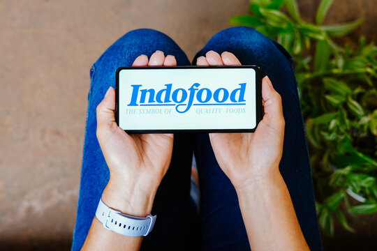 June 18, 2023, Brazil. In this photo illustration, the PT Indofood Sukses Makmur Tbk logo is displayed on a smartphone screen.