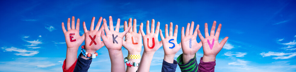 Children Hands Building Word Exklusiv means Exclusive, Blue Sky