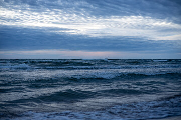 Obraz premium sky over the sea with little waves in blue and white tones