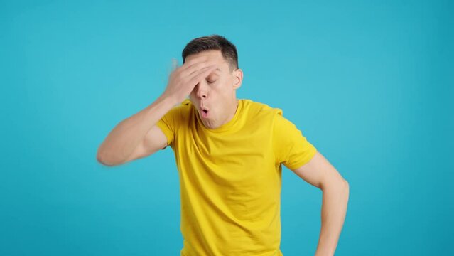 Smiling man realizes he has made a mistake