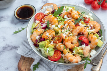 Shrimp salad with cherry tomatoes and avocado