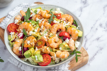 Shrimp salad with cherry tomatoes and avocado