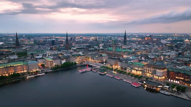 Aerial view over the Hamburg at sunset. drone flying over Alster lake. city skyline. Germany