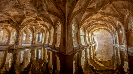 Historic catacombs with water in their corridors