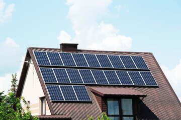 Fototapeta premium Installing a Solar Cell on a Roof.