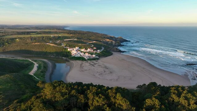 Aerial view of Praia de Odeceixe along Ribeira de Seixe river, Odeceixe, Faro, Portugal.