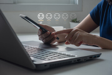 Customer review satisfaction feedback survey concept, woman using mobile smart phone with customer service and five stars satisfaction rating on the online web application. concept on a virtual screen
