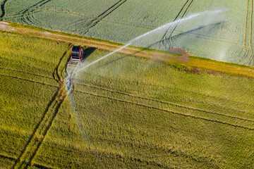 Irrigation system with a water jet on a field