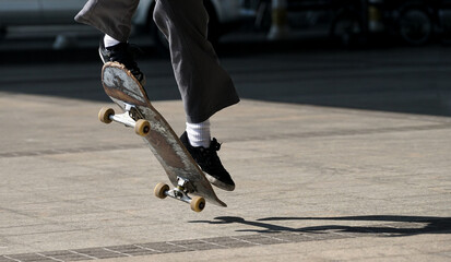 skateboarder in action on a track / Close up playing skateboard - obrazy, fototapety, plakaty