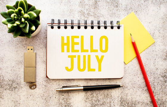 Hello July text message on paper card with beautiful flowers decoration