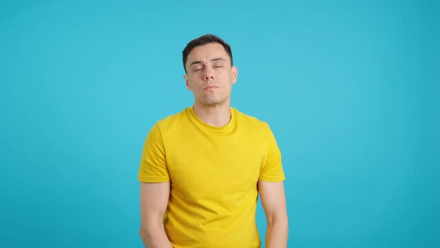 Man with a cold blowing his nose