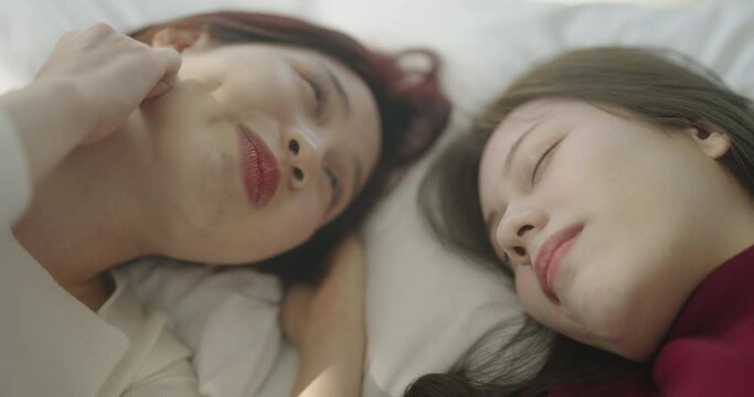 Roommate concept of 4k Resolution. Asian girls chatting in the bedroom.