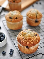 blueberry muffins on a table