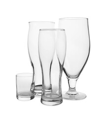 Different elegant empty glasses isolated on white