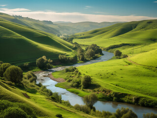 Peaceful countryside with rolling green hills and a meandering river.