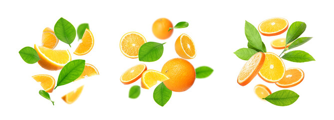 Set of cut and whole oranges with green leaves flying on white background