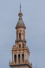 Obraz premium Side tower of the central square. Seville, Spain. Spanish Square (Plaza de Espana)