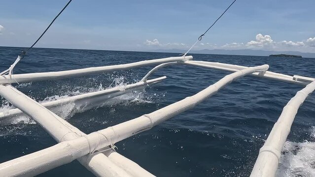Riding a Bangka Boat on the Way to Pescador Island During an Island Hopping Tour in Moalboal, Philippines