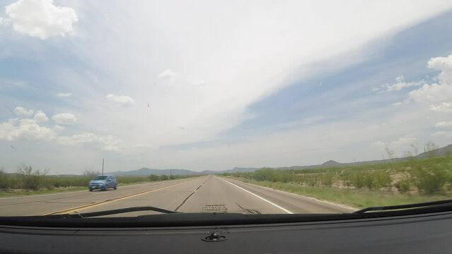 Timelapse or Hyperlapse view of driving on the highway in West Texas, Big Bend Region