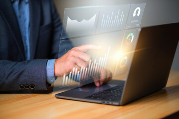 Digital economic analysis and Investment planning concept, Businessman  working with digital finance technology of invest strategy for perceptive financial business decision.
