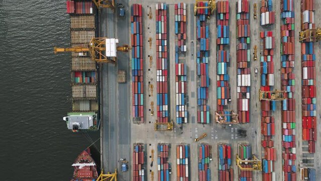 Container ship loading and unloading in deep sea port, Aerial view of business logistic import and export freight transportation by container ship, Container loading cargo freight ship