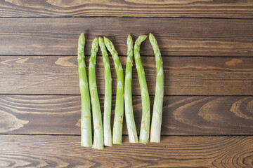 vegan healthy food concept. asparagus on wooden background