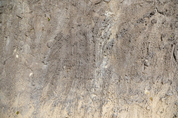 grungy textured stone wall with white markings and gray brown background pattern wallpaper texture nature building