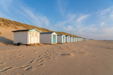 Fototapeta na wymiar On the coast with beach huts