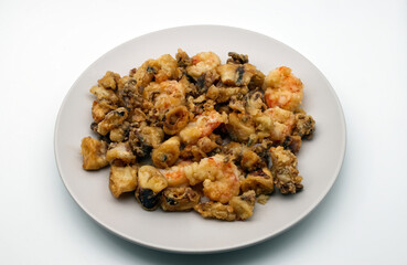 Italian dish Fritto misto di pesce, mixed fried fish, shrimp, squid and octopus fried.