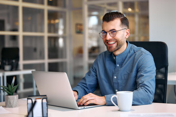 Successful hipster team in coworking. Freelancers.