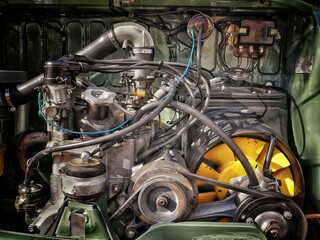 Fototapeta premium Engine of an old classic car under the hood 